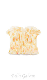 print ruffle trim top in yellow