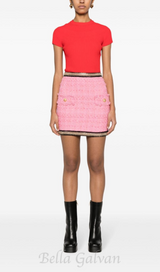 CHAIN-EMBELLISHED TWEED MINI SKIRT IN PINK