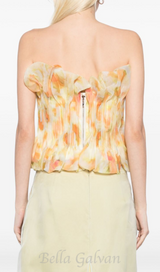 print ruffle trim top in yellow