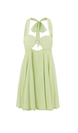 PLEATED HALTER MINI DRESS IN GREEN