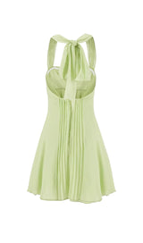 PLEATED HALTER MINI DRESS IN GREEN