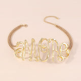 GOLD EXAGGERATED LETTER CHOKER