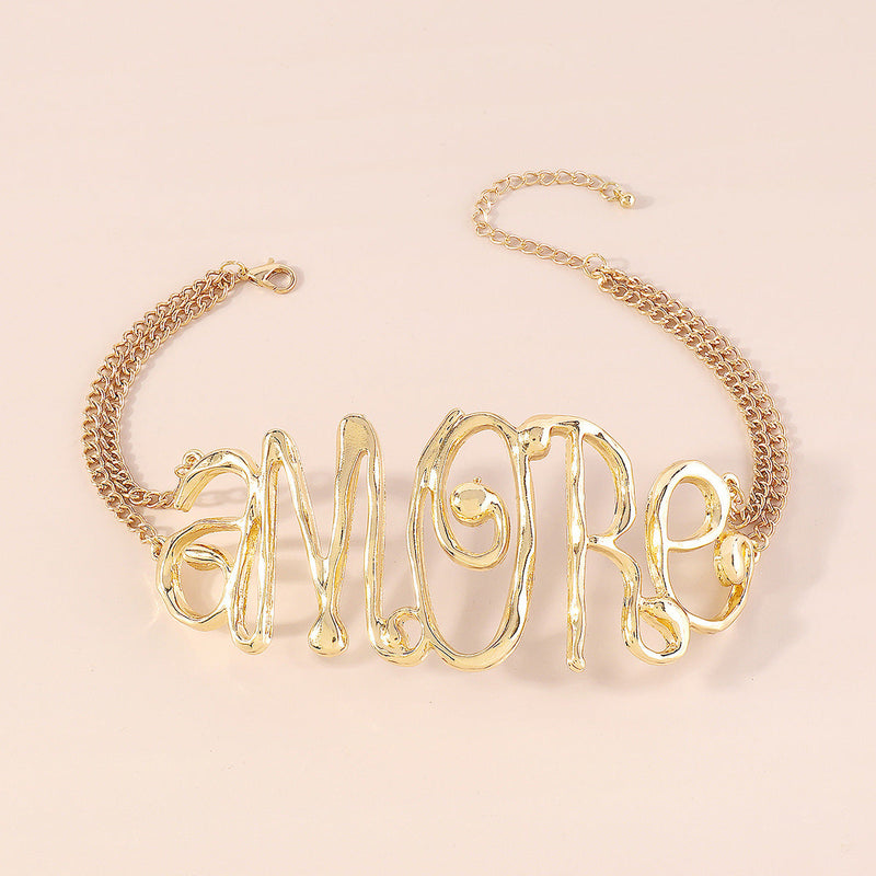 GOLD EXAGGERATED LETTER CHOKER