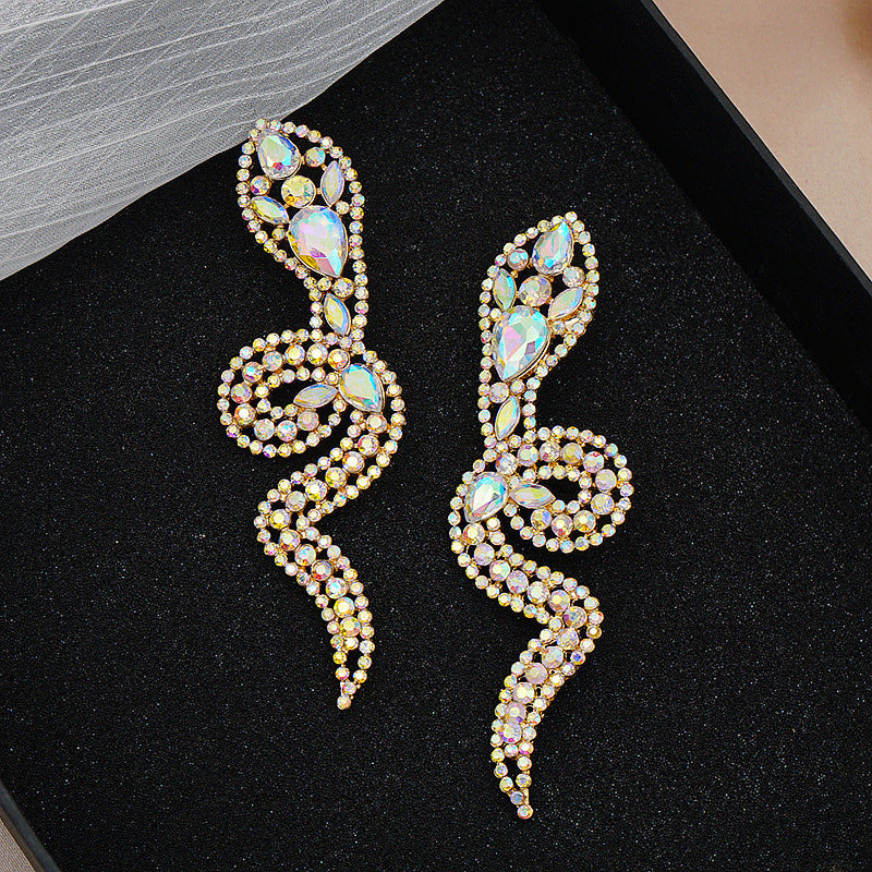 SONIA DIAMANTE SNAKE EARRINGS