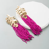 TASSEL EARRINGS IN HOT PINK